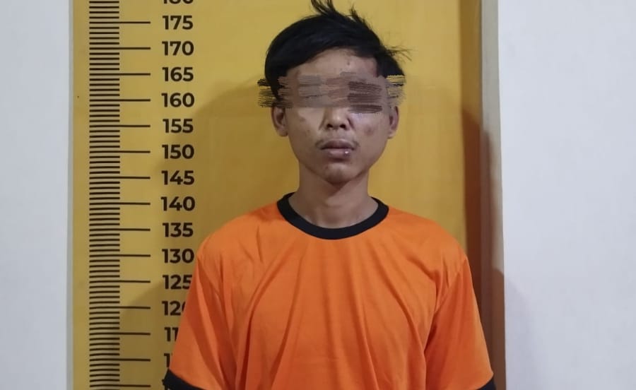 Rp (23) tersangka pelaku